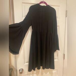 Bell sleeved black dress